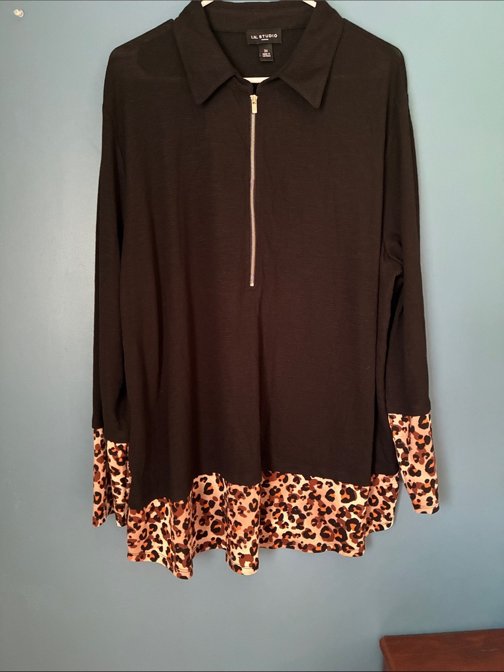 Black Zip-Front Long Sleeve Top with Leopard Hem